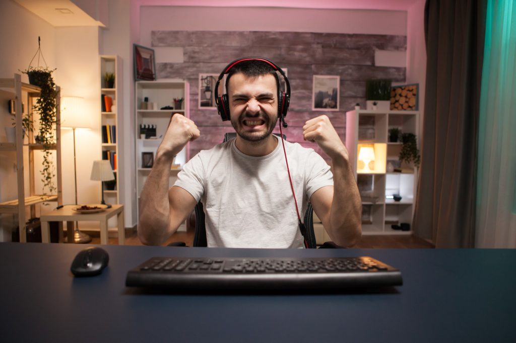 man looking happy - pros and cons of youtube automation