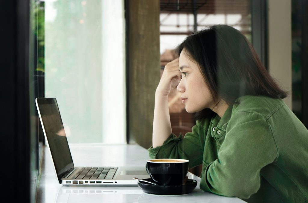 woman on a laptop - What is YouTube Automation