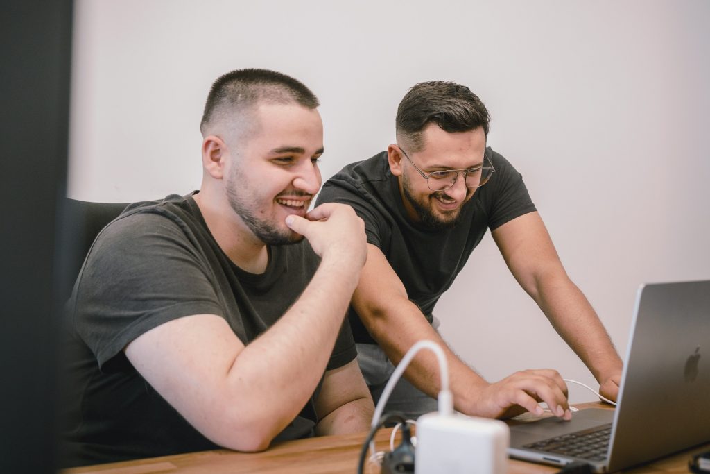 man smiling - pros and cons of youtube automation