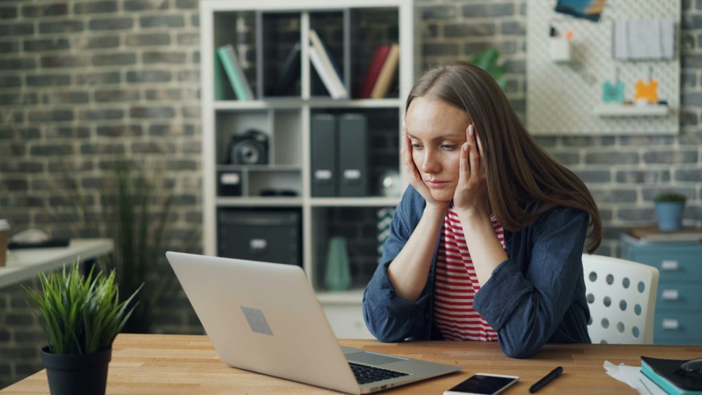 woman looking upset - pros and cons of youtube automation